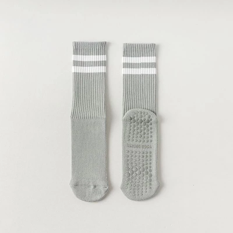 Calcetines de yoga de algodón antideslizantes de media caña con amortiguación para pilates y deportes.
