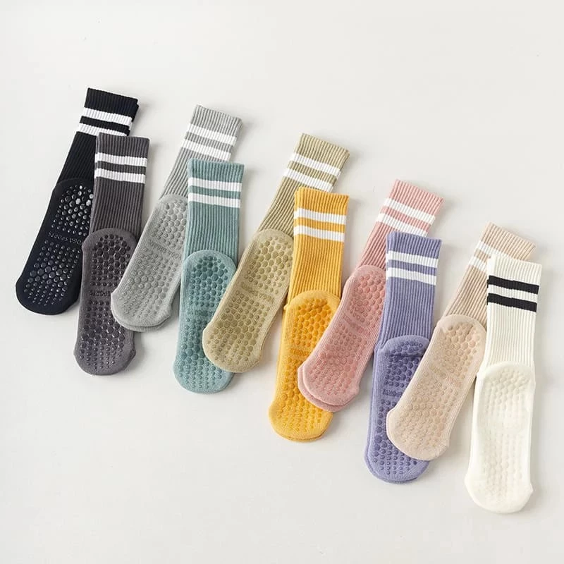 Calcetines de yoga de algodón antideslizantes de media caña con amortiguación para pilates y deportes.